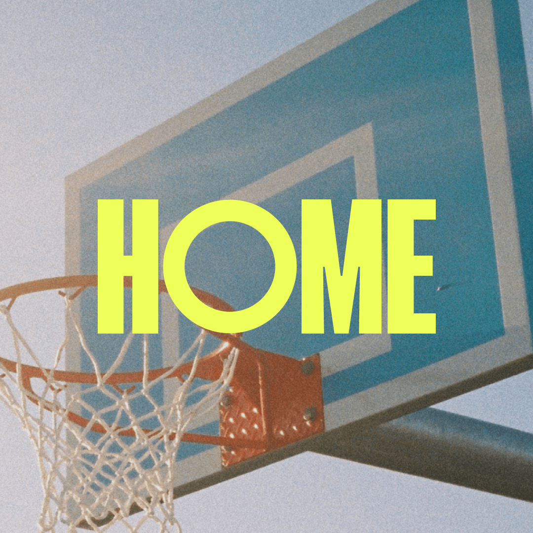 HOME logo with basketball hoop in the background